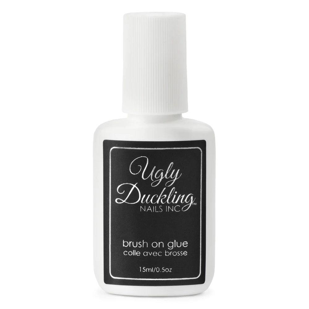 UGLY DUCKLING BRUSH ON GLUE (ADHESIVE) .5 OZ/15 ML - Purple Beauty Supplies